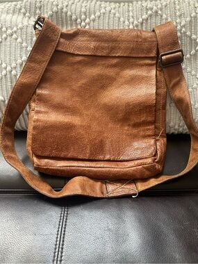 Distressed brown leather crossbody messenger bag